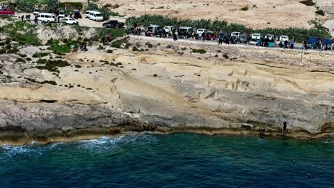 Wide angle high quality drone shot of blue Mediterranean sea and rugged Stock Footage 329469838
