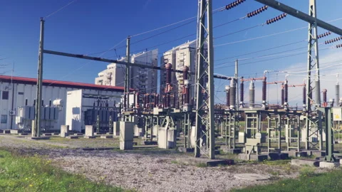 Wide angle, high voltage substation with tall pylons Stock Footage 142581466