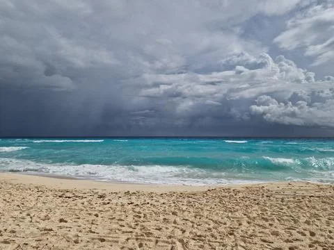 Wide-Angle Horizontal Landscape of an Approaching Tropical Storm Over Coastline Stock Photos