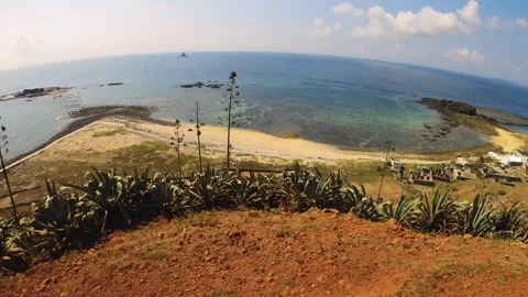 Wide angle horizontal pane look out  to the south shore horizon sea ocean scape  Stock Footage 243000131