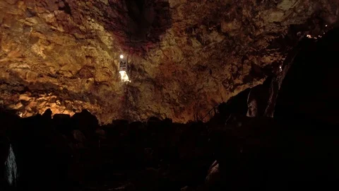Wide angle Iceland people inside volcano magma chamber Video stock 82273929