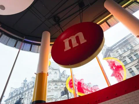 Wide-angle interior view of an M and M's candy store with giant red sign an.. Stock Photos