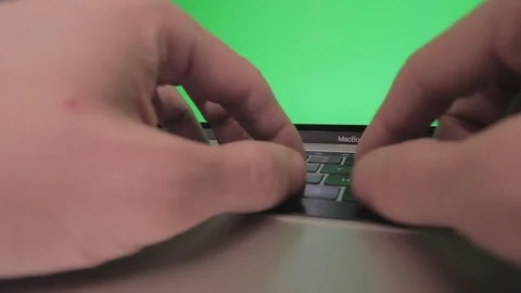 Wide angle of a keyboard of a laptop with green screen Stock Footage 120594789