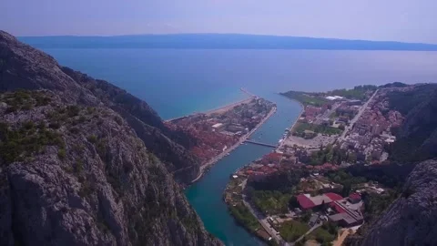 Wide Angle Landscape of High Mountains and Deep Valley Stock Footage 329655785