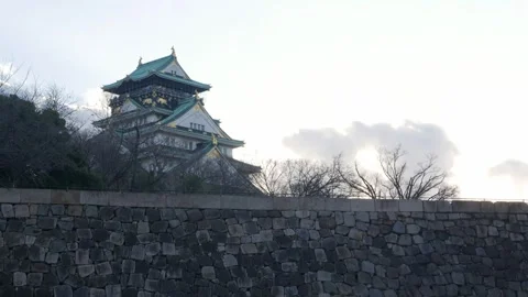 Wide angle landscape view of Castle in Osaka among sunset overcast sky in w.. Stock Footage 313039209