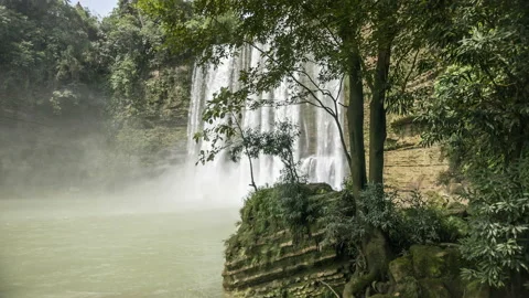 Wide angle landscape view of Niludhan waterfalls on a sunny day in summer. Stock Footage 117876969