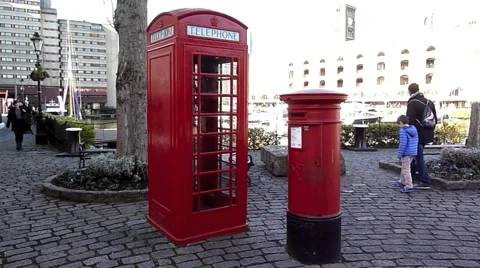 Wide angle of a London Iconic Red Post Box and Red  Phone Box London UK  Video stock 47209615