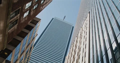 Wide Angle Looking Up At Tall Buildings in Financial District, 4K Stock Footage 259064098