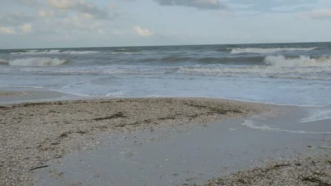 Wide angle Low view of Pass-s-grille beach in St. Pete Beach Florida looking wes Stock Footage 281963408