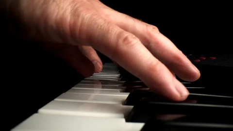 Wide angle macro of electronic keyboard - person playing, lens moves Stock Footage 127316454
