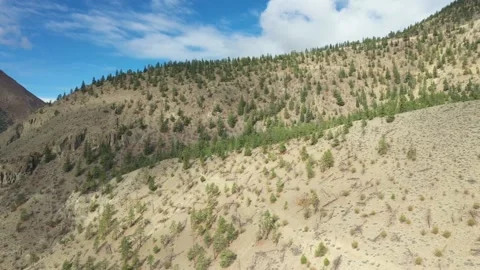 Wide Angle Mountain Side Drone Shot Stock Footage 146553805