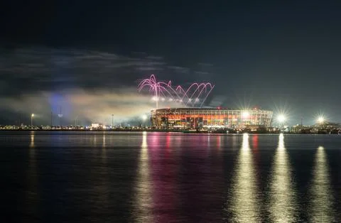 Wide angle night view of curved fireworks over Stadium 974, Ras Abu Aboud. Stock Photos