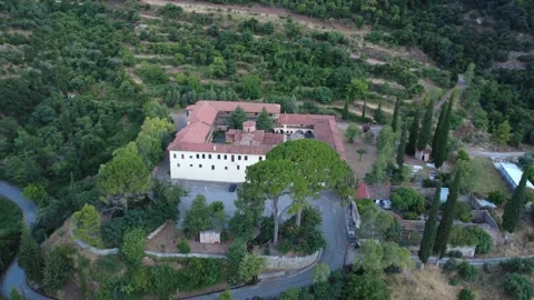 Wide angle orbit aerial view of a mountain Byzantine monastery Stock Footage 343961284