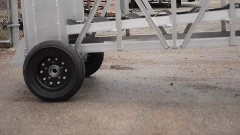 A Wide angle pan right of crane lowering Video stock 155537615