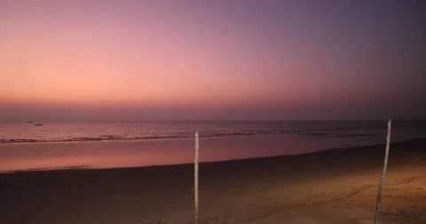 Wide angle panning view of a totally empty beach during sunset. Stock Footage 169985972