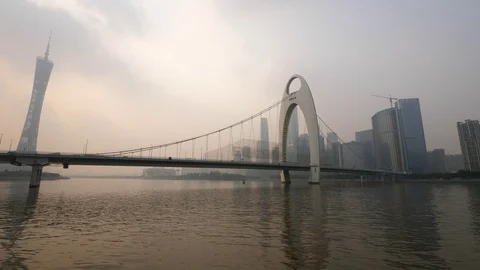 Wide angle panorama of Liede bridge, Canton tower and tall buildings Stock Footage 92491273