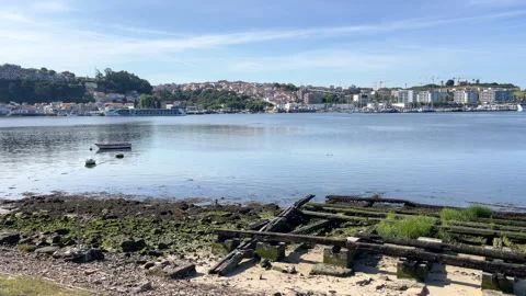 Wide angle panorama of old ruined wooden dock on Douro river bank in Porto. View Stock Footage 330752201
