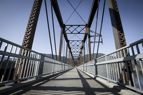Wide angle perspective of old bridge. Stock Photos