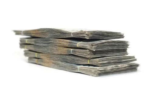Wide-angle perspective showing multiple thick bundles of paper currency nea.. Stock Photos