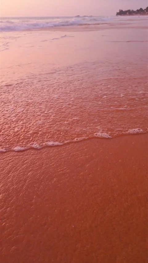 Wide Angle Pink Afterglow In Slow Motion Over Calm Hikkaduwa Beach Stock Footage 329164997