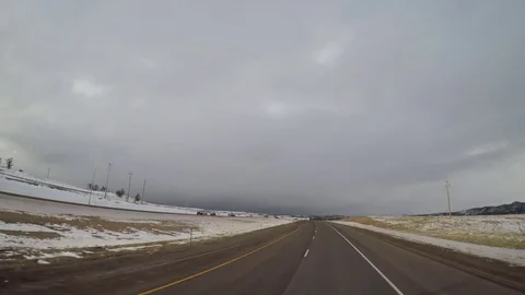 Wide Angle POV Driving Shot -  Wyoming, USA in Winter Stock Footage 70778809