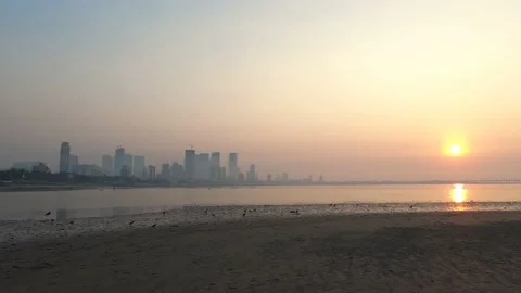 Wide Angle Real time footage of Mumbai Skyline on a smoggy evening during sunset Stock Footage 146004692