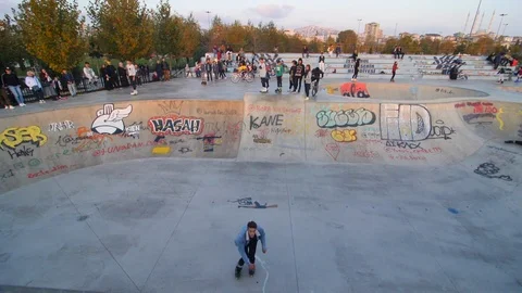 Wide Angle of a Roller Skating on Ramp in Slow Motion Stock Footage 121007792