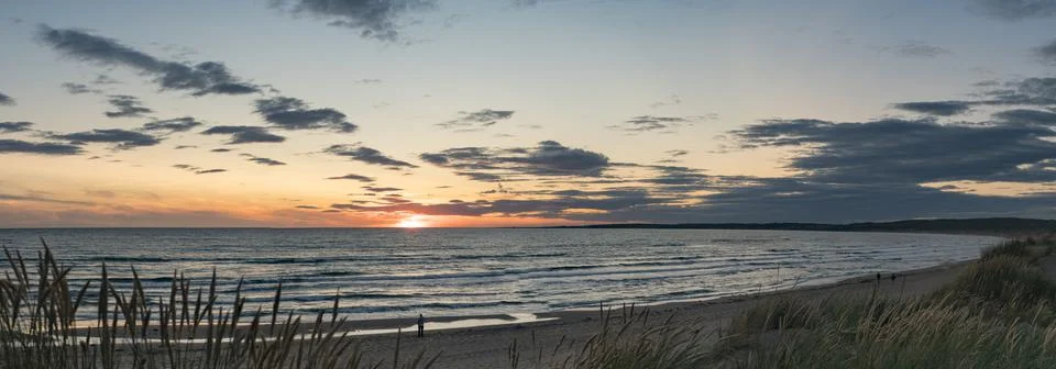 Wide angle Setting sun at beach Tylosand Halmstad, popular beach Stock Photos