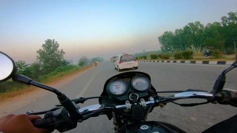 A wide angle Shoot on a motorcyclist Riding 動画素材 146149710