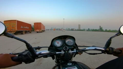 A wide angle Shoot on a motorcyclist Riding 動画素材 146149997