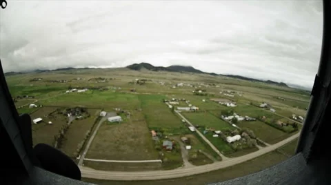 Wide angle shot from in Black Hawk helicopter of the training base and Stock Footage 52701749