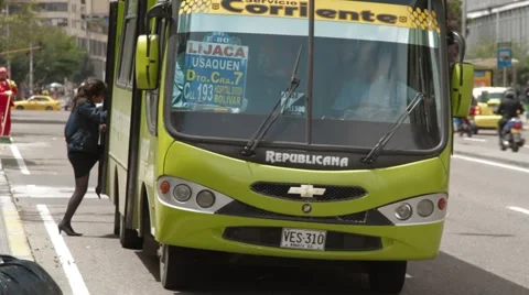 Wide Angle Shot of a bus picking passenger over the 7th Avenue Stock Footage 42269393