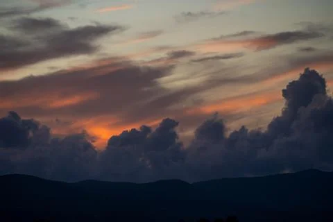 Wide angle shot of a dramatic sky during sunset Stock Photos