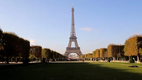 Wide angle shot of the Eiffel tower in Paris France on an autumn day Stock Footage 106355958
