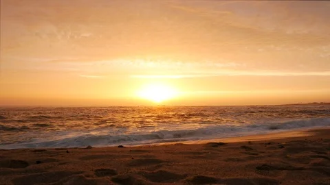 Wide angle shot over sandy beach at sunset in Portugal Stock Footage 111168446