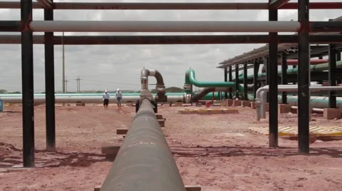 Wide Angle Shot of Pipes and infrastructure inside an Oil Well Stock Footage 45236851