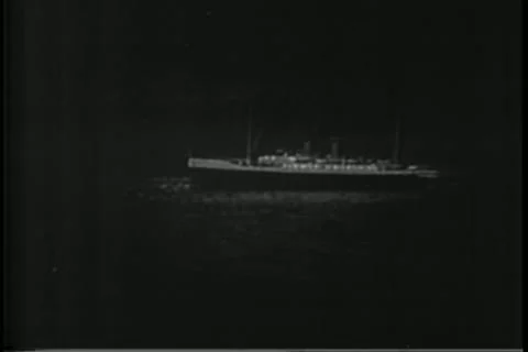 Wide angle shot of ship sailing at night Stock Footage 11348539
