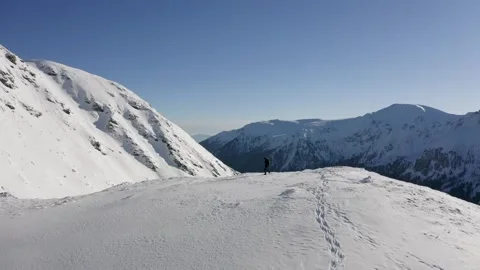 Wide Angle Shot of Snow Slopes and Blue Horizon Stock Footage 332140130