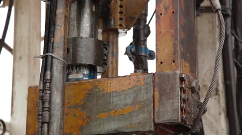 Wide Angle Shot of two oil and gas workers at an oil well Stock Footage 45236588