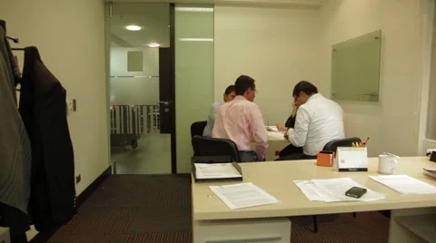 Wide Angle Shot of a work meeting at an office Stock Footage 45236293