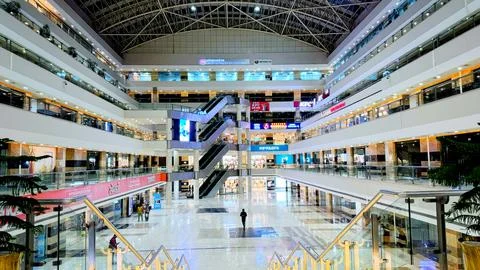 Wide-angle side view of JMD Empire Square shopping mall Stock Photos