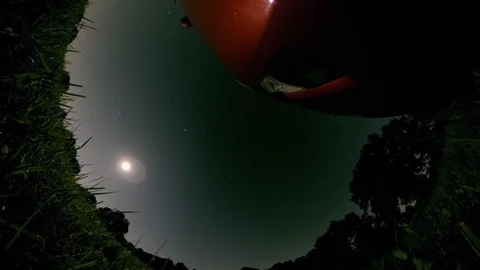 Wide Angle Sky at Night with Car Bumper and Moon Time Lapse Reveal Stock Footage 109581843