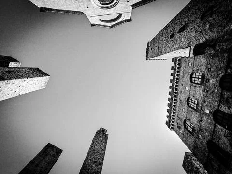 Wide angle sky view at the Piazza del Duomo in San Gimignano Stock Photos