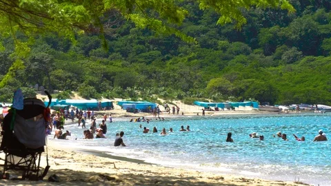 Wide Angle Slow Motion of BAHIA CONCHA Beach in Parque Tayrona Stock Footage 102482397