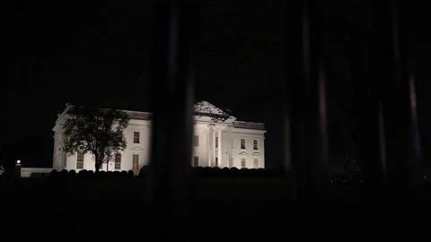 Wide angle slow motion to the right night view of the US Presidents home, the Stock Footage 237935098
