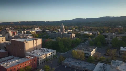 Wide-angle slow orbit drone shot of the Idaho State Capitol building in Boise Stock Footage 339505303