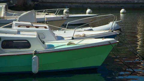 Wide Angle of Small Boat in Harbor Stock Footage 101121815