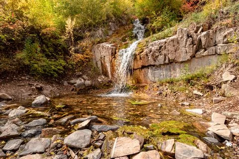 Wide angle of a small waterfall Stock Photos