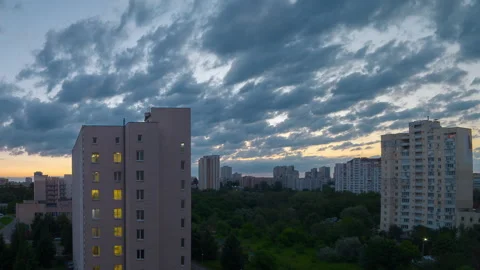 Wide angle static time lapse of city residential buildings transition from .. Stock Footage 338242255