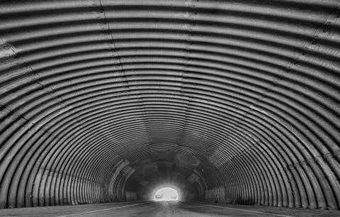 Wide angle steel city tunnel landscape view Stock Photos